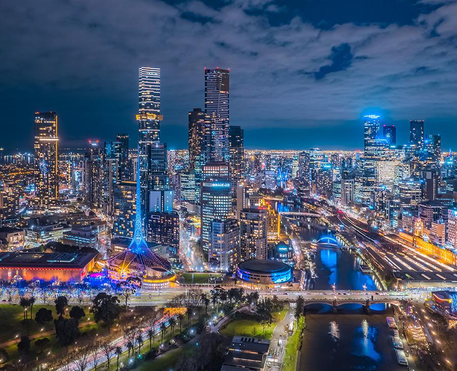 The Melbourne CBD skyline and Yarra River at night.
