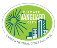 Oval green graphic that reads "climate vanguard city" with building icons. Below the oval reads "carbon neutral cities alliance"