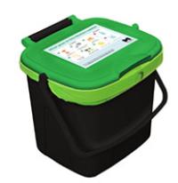 A plastic countertop bin with a green lid