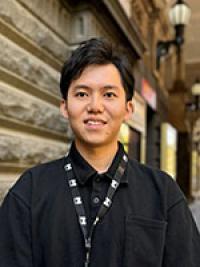 my melbourne student ambassador lok poses for camera