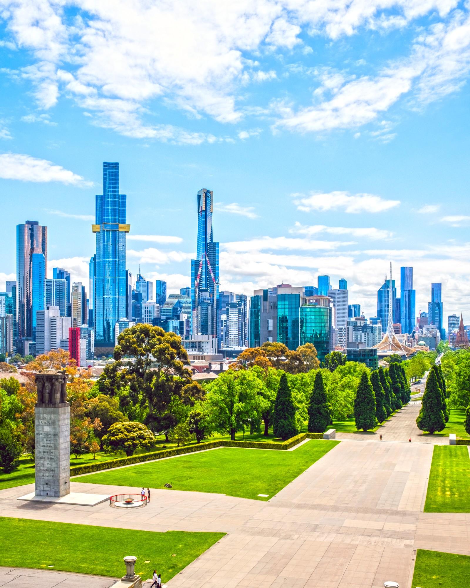 Point of view from the Shrine of Remembrance, looking down towards the walkway with Southbank and CBD skyline in the distance.