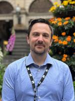 My Melbourne ambassador Christopher Alory, standing in front of Melbourne Town Hall.