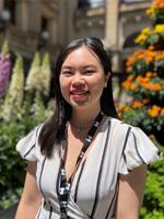 My Melbourne ambassador Eva Su, standing in front of Melbourne Town Hall.