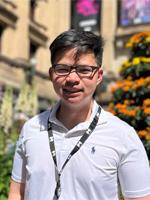 My Melbourne ambassador Rod Romero, standing in front of Melbourne Town Hall.