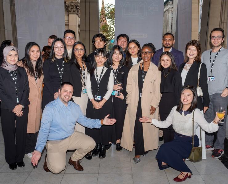 A large group of people posing for the camera